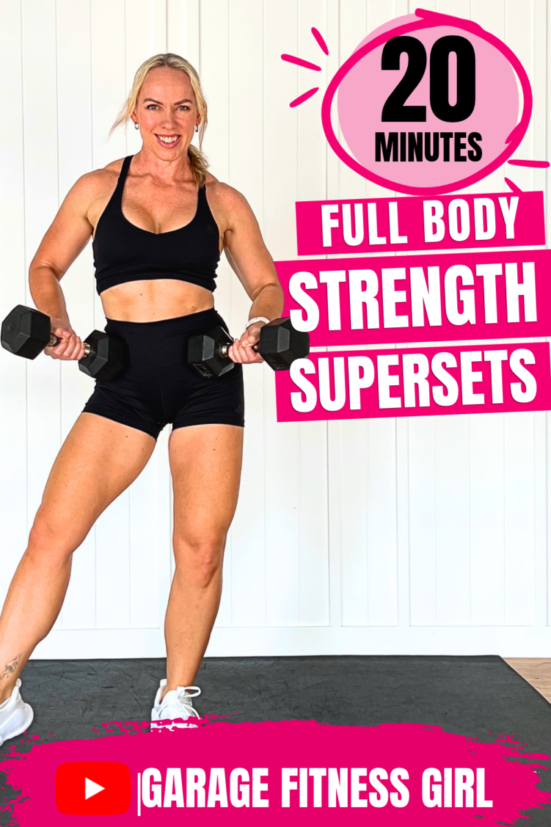 Woman over 40 holding a pair of dumbbells in a home gym for a 20 minute full body strength workout, with the words full body strength supersets