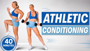 Penny from Garage Fitness Girl holding dumbbells in a 40 minute athletic strength and conditioning workout for women over 40