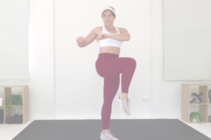 Woman doing a low impact workouts routine at home on a yoga mat