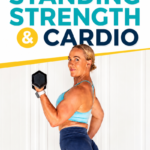 Woman in a light blue sports bra and navy shorts doing a standing dumbbell bicep curl during a 35-minute standing strength and cardio workout for Garage Fitness Girl.